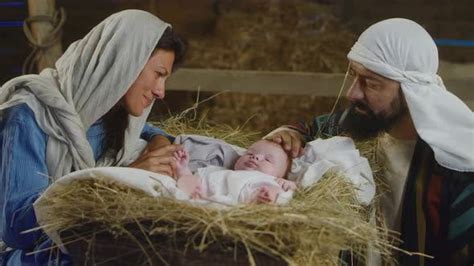 Mary And Joseph Speaking With Baby Jesus In Manger Stock Footage