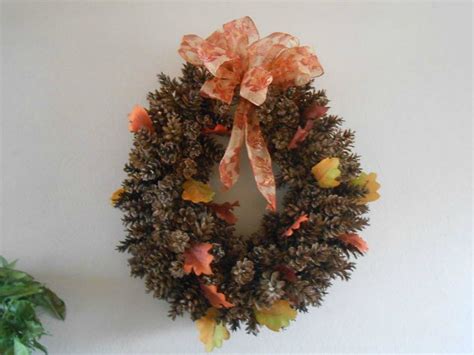 A simple pine cone garland adds a natural touch to seasonal décor. These Cut Up Pine Cone Decor Ideas Are Perfect for Fall ...