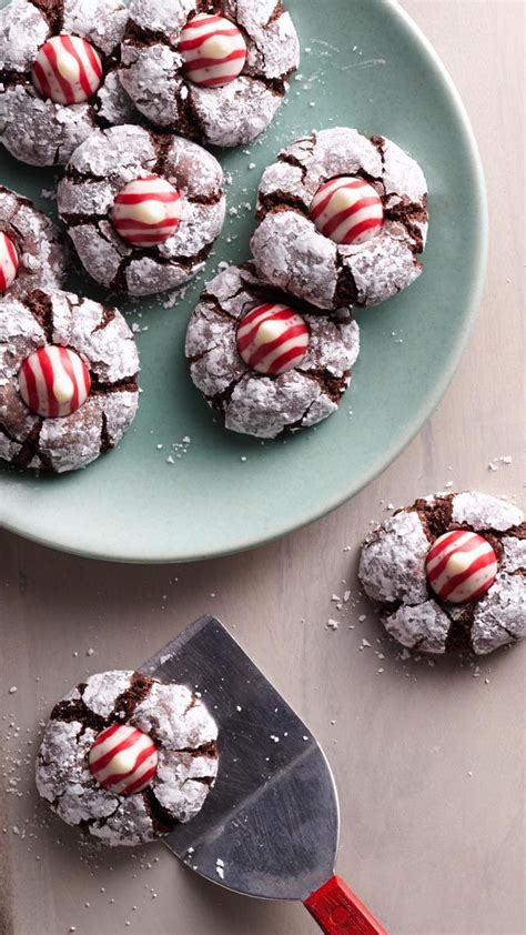The best thing about this particular cookie recipe is that you can use whatever kind of hershey's kiss strikes your fancy — this rendition calls for hershey's kisses with caramel, but any. Hershey Kiss Christmas Cookies - Peanut Butter Blossoms - If You Give a Blonde a Kitchen - In ...
