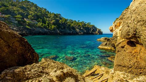 How to spend your summer on the best beaches in the balearic islands. Cala Deia tropic empty beach, Palma Mallorca, Balearic ...
