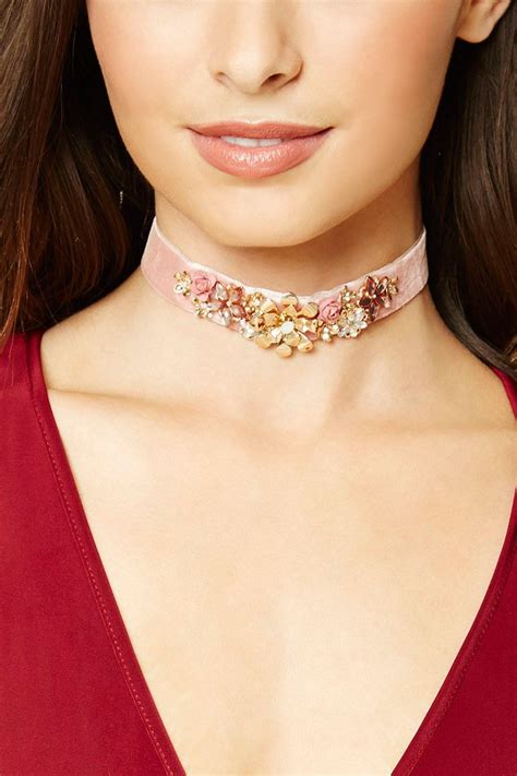 A Velvet Choker Featuring An Embellished Floral Design With Faux Gems High Polish Ends And A