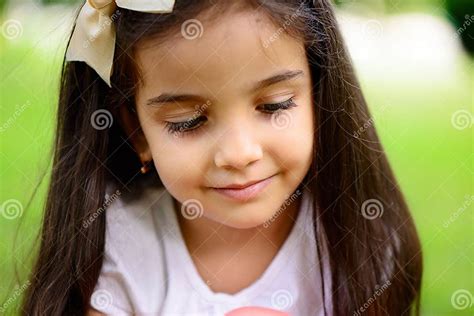 Portrait Of Hispanic Girl In Sunny Park Stock Image Image Of Cheerful