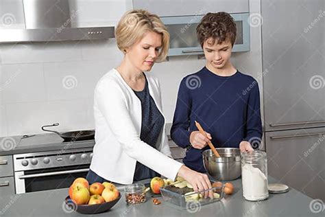 mother and son in the kitchen stock image image of preparing european 65173179