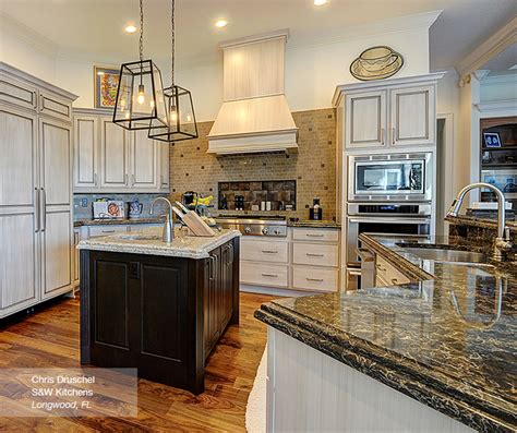 Chantilly lace painted cabinets designed by jessica mcallister of d&b elite construction group for a traditional style kitchen in wyomissing, pennsylvania. Off White Cabinets with a Dark Wood Kitchen Island ...