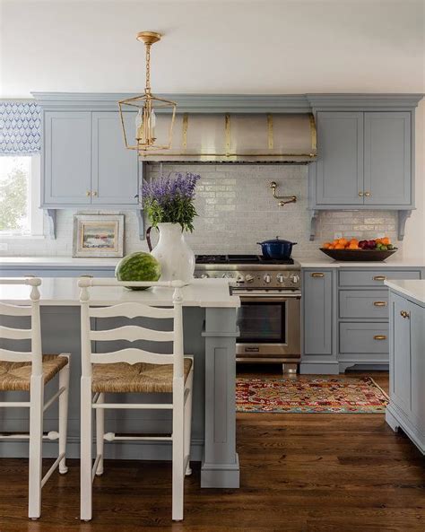 Great kitchen cabinets should give you joy every time you use your kitchen. Blue Gray Kitchen Cabinets with Antique Brass Hardware ...