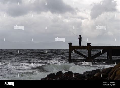 Portencross Scotland UK 5th July 2020 UK Weather A Man Fishing
