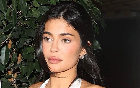 Kylie Jenners White Tights Naked Dress And Double Handbag Look Is Such A Rich Text Glamour