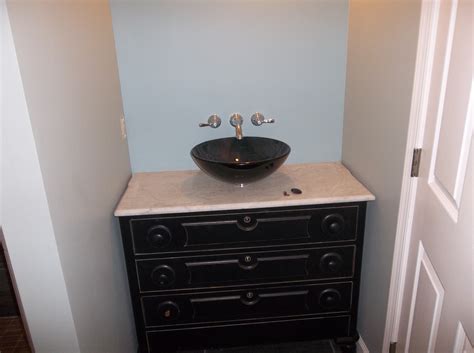 White and black vanities are some of the most popular, but other trending colors and finishes include navy, gray, light oak and rich espresso. downstairs bathroom vanity/sink repurposed chest of ...