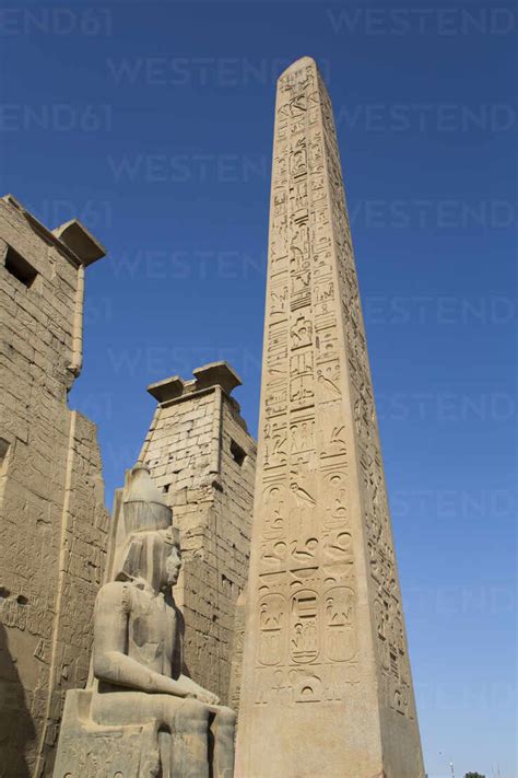 Colossus Of Ramses Ii In Front Of Pylon Obelisk Luxor Temple Unesco