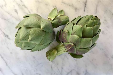 A Step By Step Guide To Trimming Fresh Artichoke Hearts