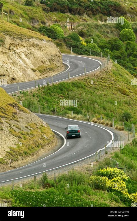 Car On Winding Mountain Road New Zealand Stock Photo Alamy