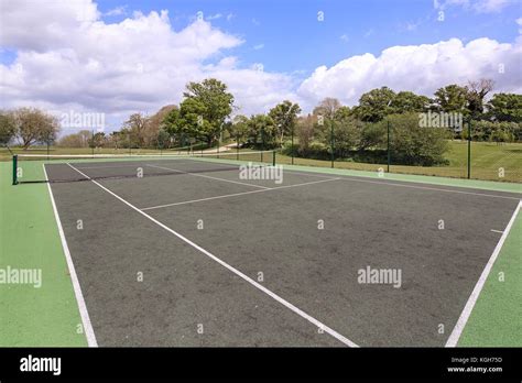 Tennis Court In The Grounds Of Luxury Mansion House Stock Photo Alamy