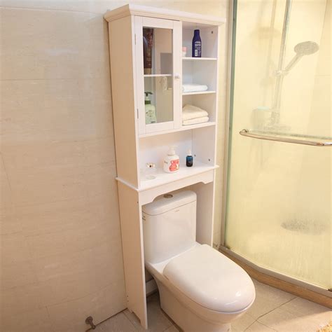 This storage cabinet stands 67 inches tall and is 12 inches wide. AdecoTrading 24" x 68.5" Free Standing Over the Toilet ...