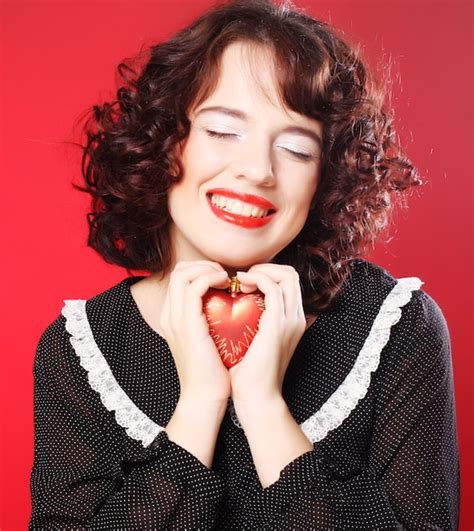 Premium Photo Woman Holding Red Heart