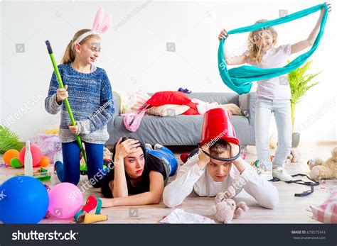 Tired Parents Romping Kids Stock Photo 679575343 Shutterstock