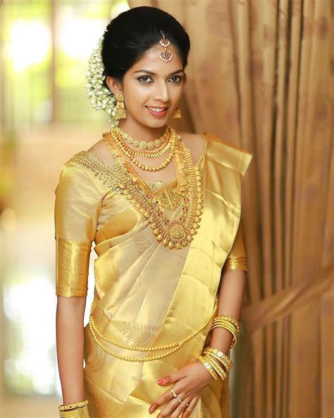 Kerala Bride In Gold South Indian Bride Saree Indian Bridal Sarees Kerala Wedding Saree