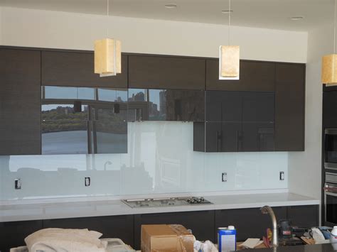 Low to high labor cost range differences are in part due to variations in work load, job location and seasonal. Back-Painted Glass Sample | Black tiles kitchen, White ...