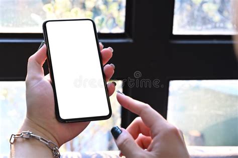 Stylish Man Holding Mobile Phone With Blank Screen For Graphic Display Montage Stock Image