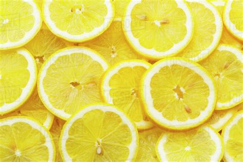 Pile Of Fresh Lemon Slices Stock Photo Dissolve