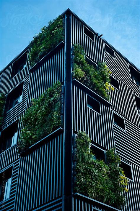 View Modern Building With Vertical Gardens By Stocksy Contributor