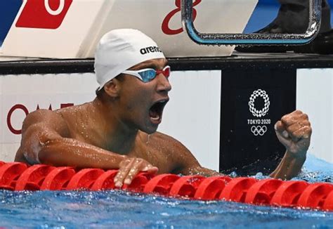 tunisia s hafnaoui wins surprise olympic swimming gold flipboard