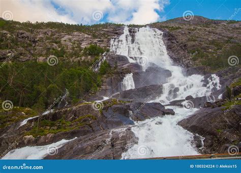 Summer Mountain Langfossen Waterfall On Slope Etne Norway Stock Photo