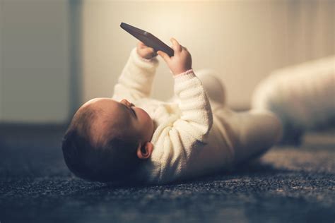 Casual Baby Watching A Mobile Phone Easy Prey Podcast