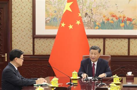 Xi Hears Report From Hksar Chief Executive Xinhua