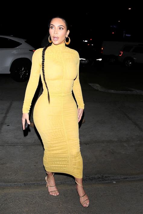 kim kardashian sexy curves in tight yellow dress at carousel restaurant in glendale hot