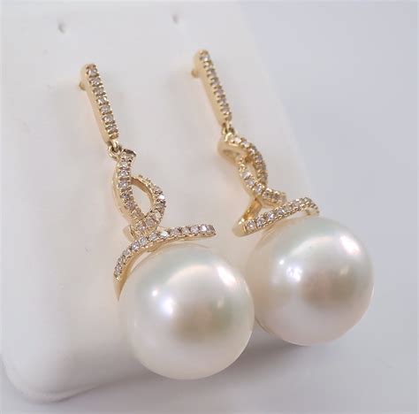 12 mm pearl and diamond dangle drop earrings 14k yellow gold june birthday wedding