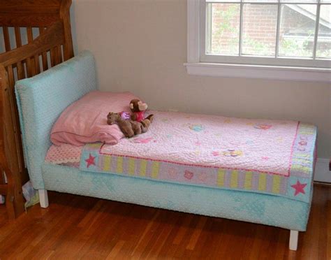 You can try find out more about do it yourself tutorial. Ana White | Upholstered Toddler (Not) Daybed - DIY Projects