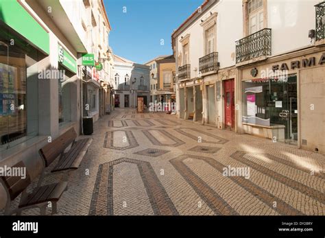 Traditional Mosaic Tiled Street In The Old Town Of Faro Portugal Stock