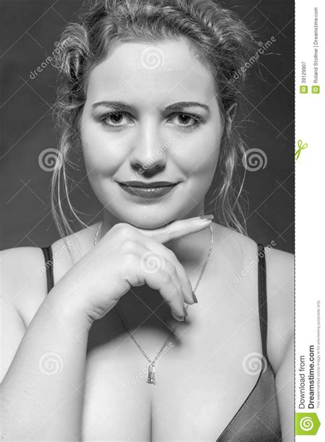 Black And White Portrait Of A Woman With Large Breasts And