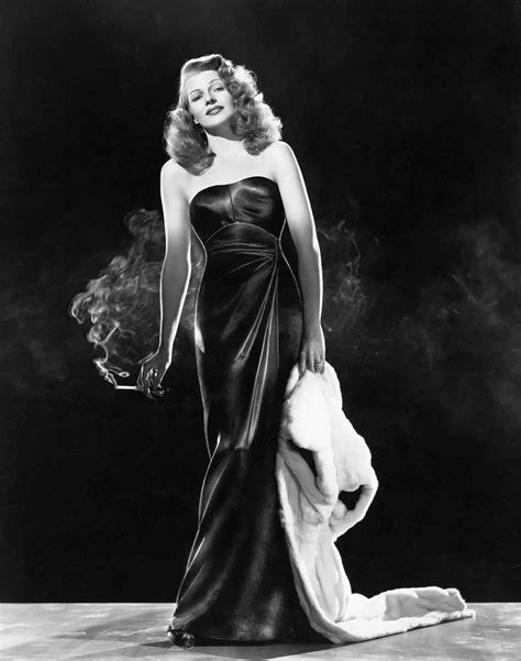 Download Vintage Charm Rita Hayworth Seen In A Candid Moment