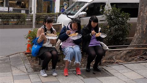 Three Japanese Girls Eating Junk Food On Stock Footage Sbv 323965364 Storyblocks