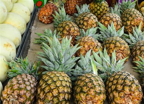 Fresh Pineapples Being Sold In Fruit Market Stock Image Image Of