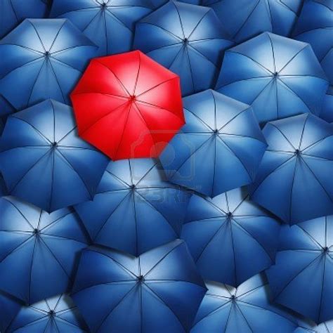 Lonely Red Umbrella Over Blue Umbrellas Light Coming Out Of Red