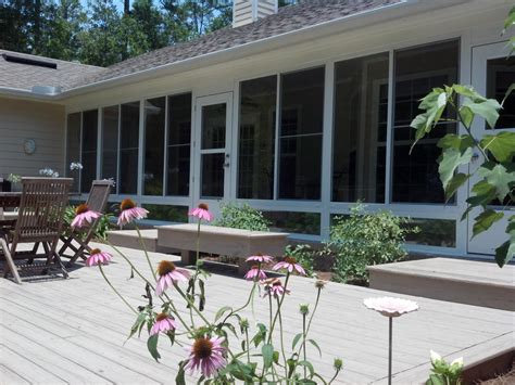 Makes outdoor space more useable and comfortable; Screen Rooms Tallahassee: Glass Patio Enclosure Project.