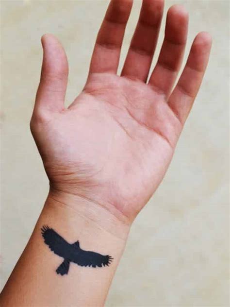 The butterfly tattoo drawn on the wrist will be. Wrist Tattoos for Men - Inspirations and Ideas for Guys