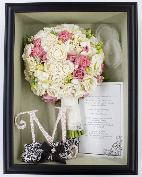 See more ideas about flower shadow box, wedding shadow box, bouquet preservation. A gorgeous bouquet of pink roses & carnations, with white ...