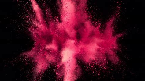 Super Slowmotion Shot Of Pink Powder Explosion Isolated On Black