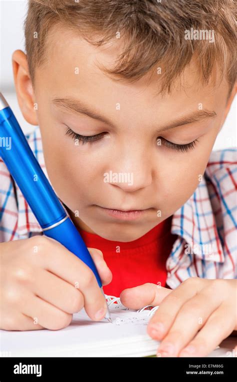 Boy Doing Homework Stock Photo Alamy