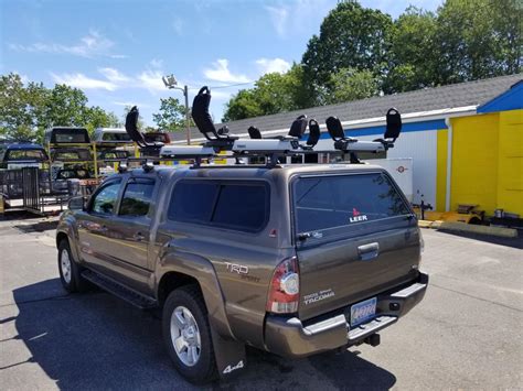 Dispersed (each bar is rated for up to 150 lbs.) and is a two section rack that rests on the truck. Roof Racks | Cap World