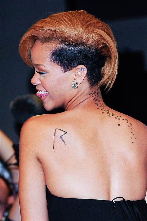 hollywood stars with tattoos rihanna tattoo of stars cascading down the neck ~