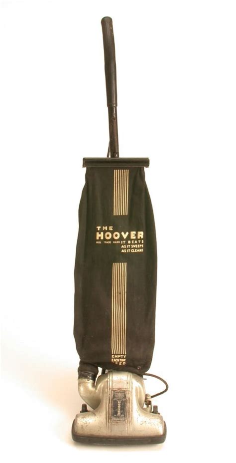 A Black And Gold Bag With A Baseball Bat In It