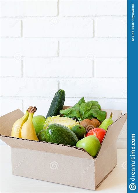 Fruits And Vegetables In A Cardboard Box And Copy Space Home Delivery