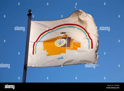 Flag Of The Navajo Nation Native American Indians Against A Blue Summer