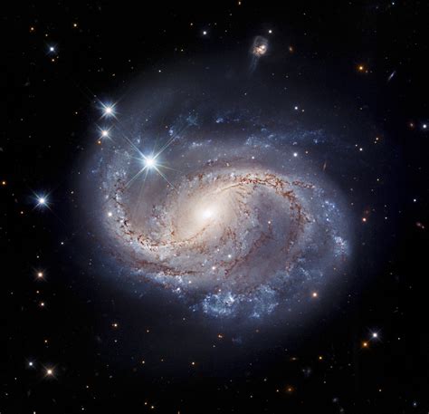 hubble captures majestic barred spiral galaxy ngc 6956 r cool science and tech