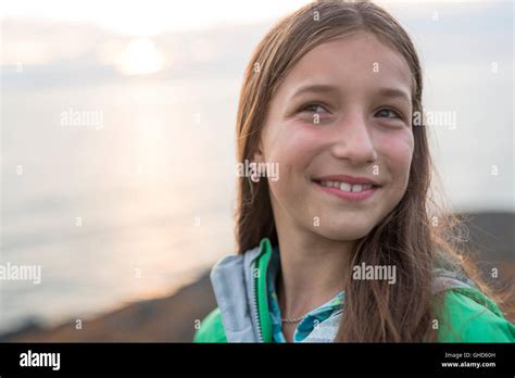 Girl Enjoying The Sunset And Having Fun Outside Stock Photo Alamy
