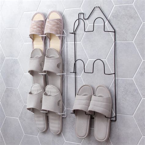 Shoe racks help in sorting your shoes out and make your living space look. Multi layer Iron Shoe Rack Wall Mounted Sticky Door Hanging Shoe Storage Shelf Slipper Organizer ...